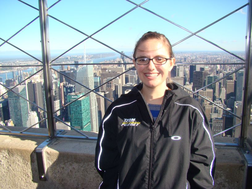 Standing on top of the Empire State Building, ever the tourist.